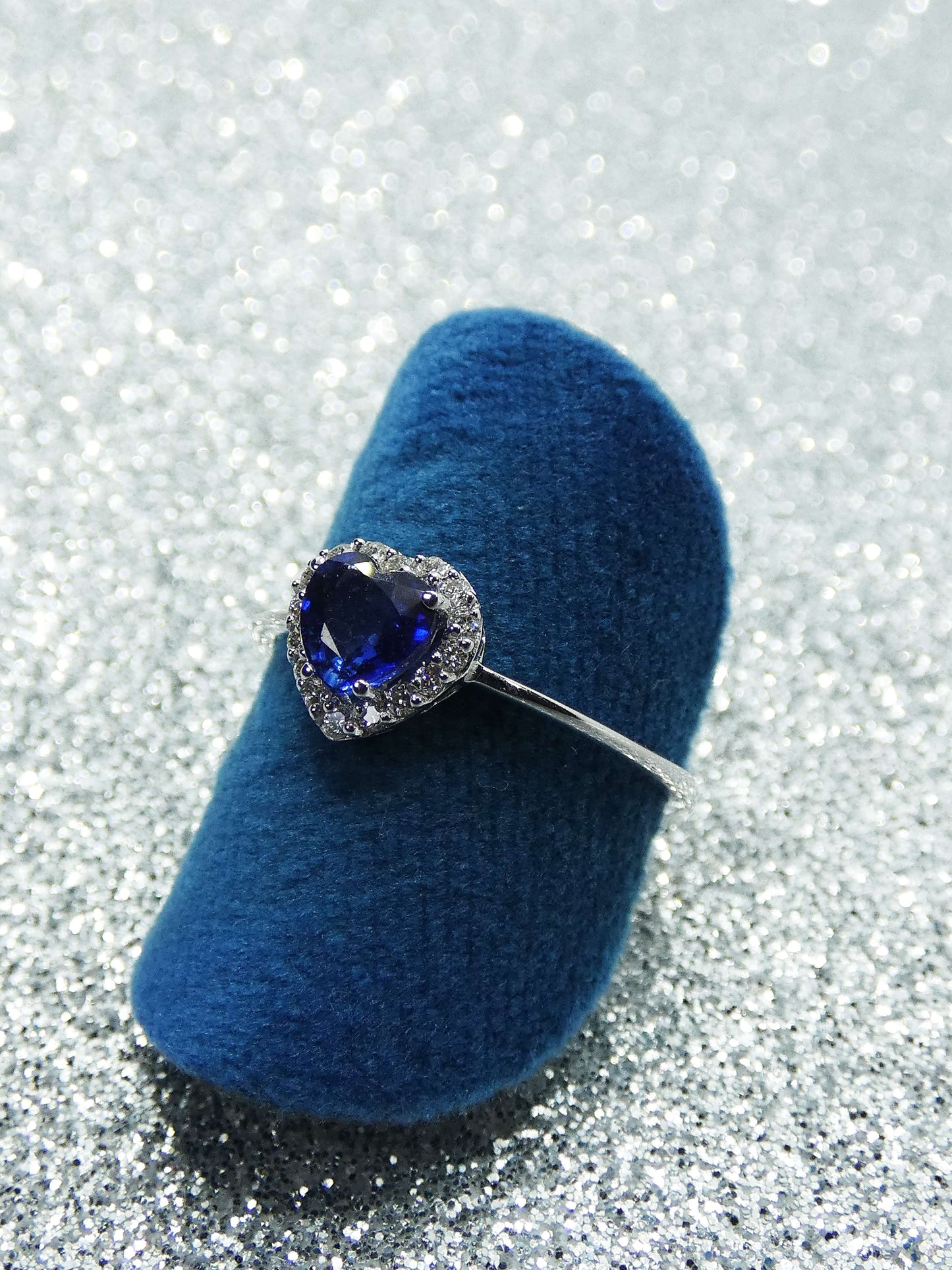 Ring with heart-shaped sapphire